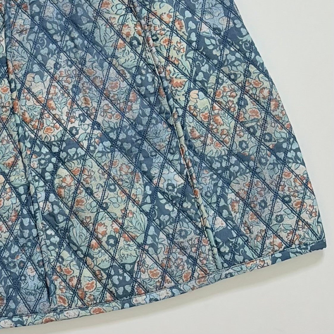 FREE PEOPLE Darla Quilted Mini Skirt Pockets Smoky Combo Tapestry Blue Size 2